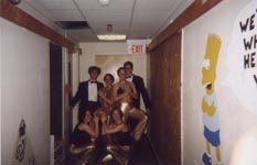 [Breath, Teresa, Katie, Scott, Erin, and Jenn sporting sexy gold pants and tuxes for the Goldfinger party]