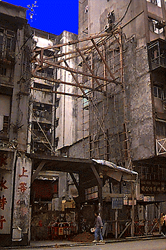interstitial truss in Hong Kong between two fire walls of a small plot in Wan Chai
