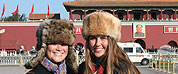 students abroad in furry hats