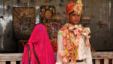 Newly wed Mamta Bai, 12, and her husband Bablu, 14, stands inside a temple in Rajgarh, about 155 kilometers (96 miles) from Bhopal, India, May 6, 2011.