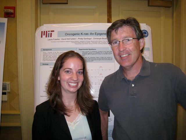 Laura and Prof. Tyler Jacks at poster presentation