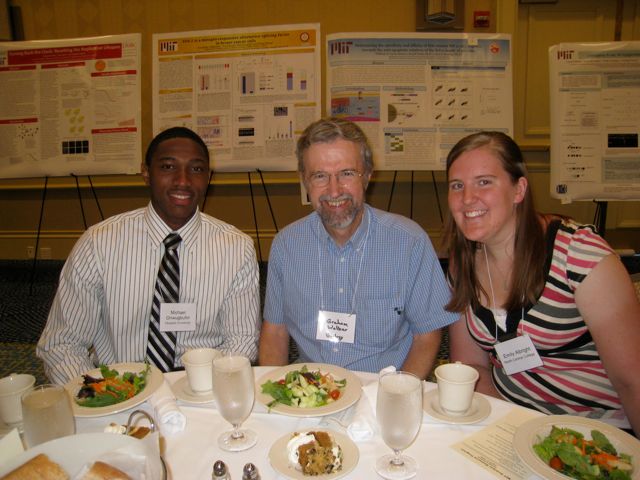 Prof. Graham Walker and his summer students at the poster presentation