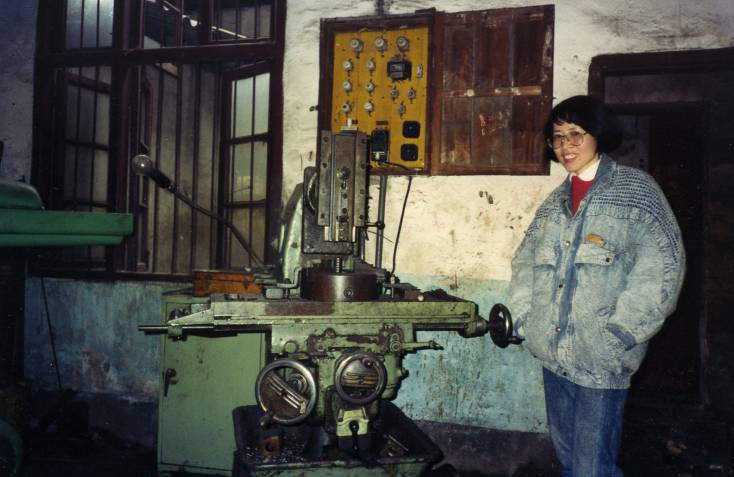 Can Xue with machine she worked on