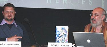 Mark Warshaw and Henry Jenkins with the Heroes comic book