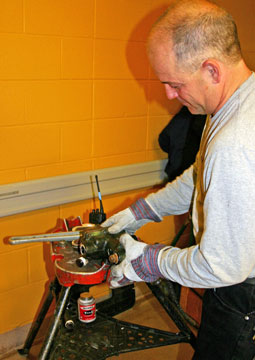 Russel Wise repairs a steam trap