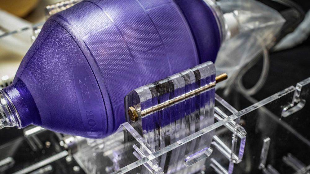 A closeup shot of the purple emergency resuscitation bag on a ventilator prototype