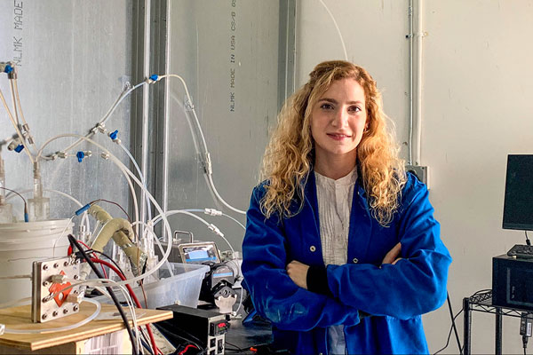 Laureen Meroueh PhD ’20 next to new device