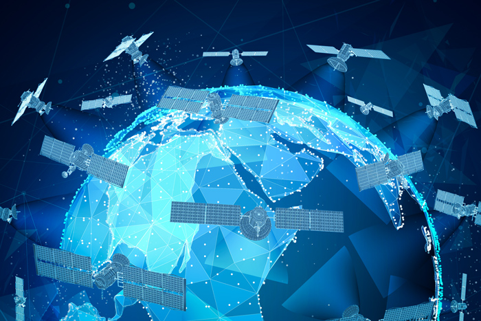 Illustration of Earth with many satellites in orbit
