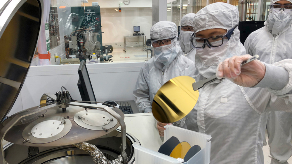 First-year undergraduate Audrey Lee loads an electron-beam evaporator with silicon wafers