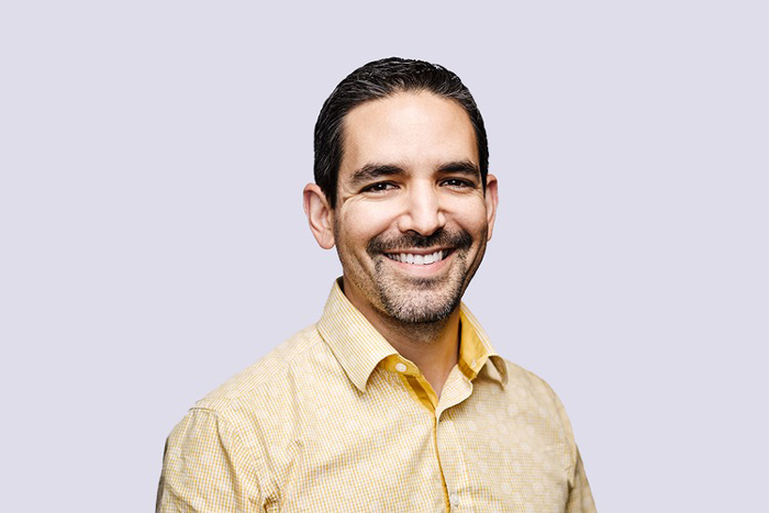 Photo of Carlos Araque smiling