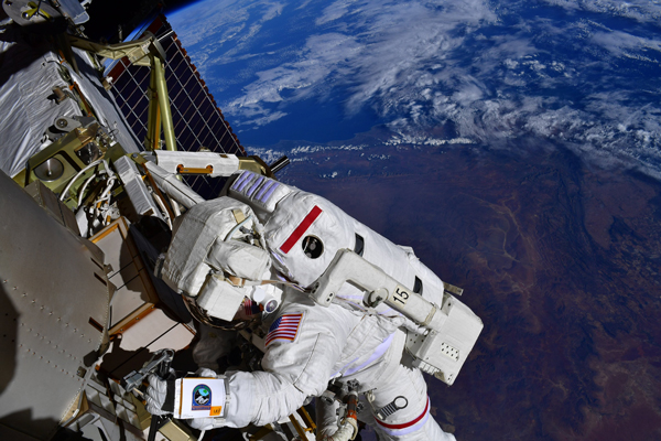 An astronaut outside the International Space Station