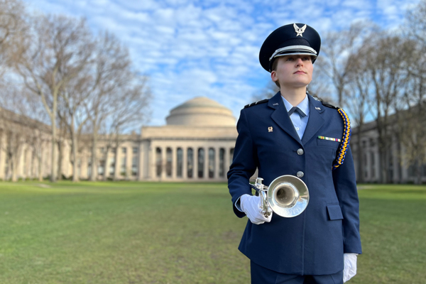 Air Force ROTC Cadet Morgan Schaefer plays “Taps” in honor of those we’ve lost.