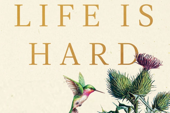 Section of a book cover that has the words, "life is hard," in all-caps, with an illustration of a hummingbird eating from a cactus flower