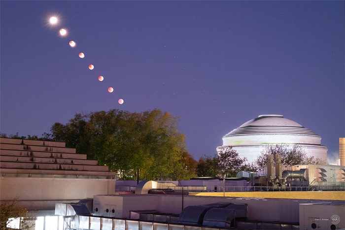 Time-lapse shows the blood moon eclipse, repeated 8 times in a diagonal line, and the Great Dome