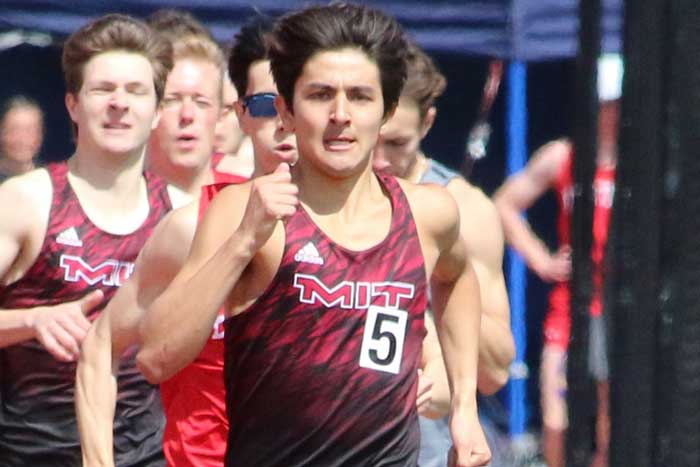 Ryan Wilson, running in front, with about 6 other runners in background