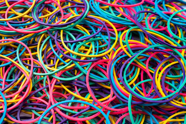 a pile of brightly colored plastic bands