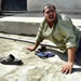 An Iraqi man is lost in tears after learning that a relative was killed in an explosion outside a police station in the Baghdad suburb of Al Sadr city Thursday Oct 9, 2003. A suicide car bomber killed at least four people in a Shi'ite Muslim area of Baghdad, police said. (AP Photo/Anja Niedringhaus)