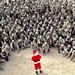 Hundreds of U.S. Marines gather at Camp Commando in the Kuwait desert during a Christmas eve visit by Santa Claus, Tuesday, Dec. 24, 2002.  (AP Photo/Anja Niedringhaus)