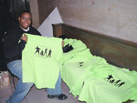 Student-designed t-shirts advertise the installation