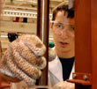 photo of engineer with spinning machine