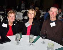 Photo: Kay Arthur, board member Kathy Doyle, and Ray Diffley are all smiles at the 2012 winter holiday gathering.