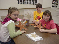 Students making star fish