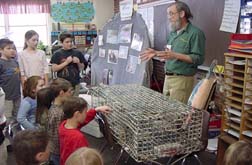 Phil showing lobster trap to class