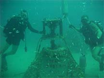 divers with underwater television system