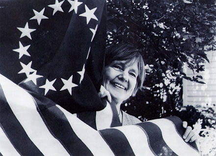 Professor Pauline Maier wrapped in a star-spangled banner.