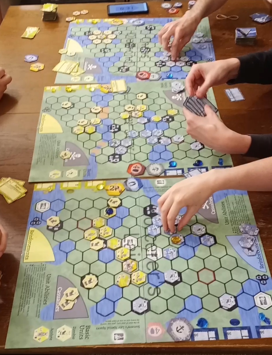 A borad game featuring two teams controlling minions on 3 boards with hexagonal grids