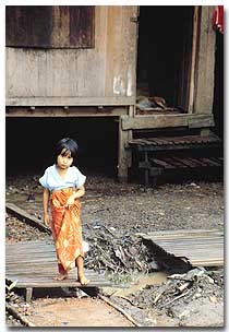 Photo: Burma - Girl on mud walk
