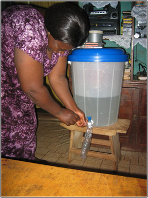 Woman and water filter