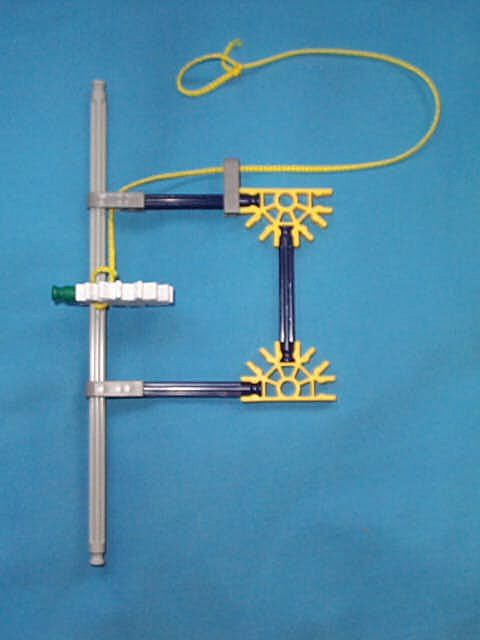 actuator rod counterweight, with cord indicating threading of monofilament line