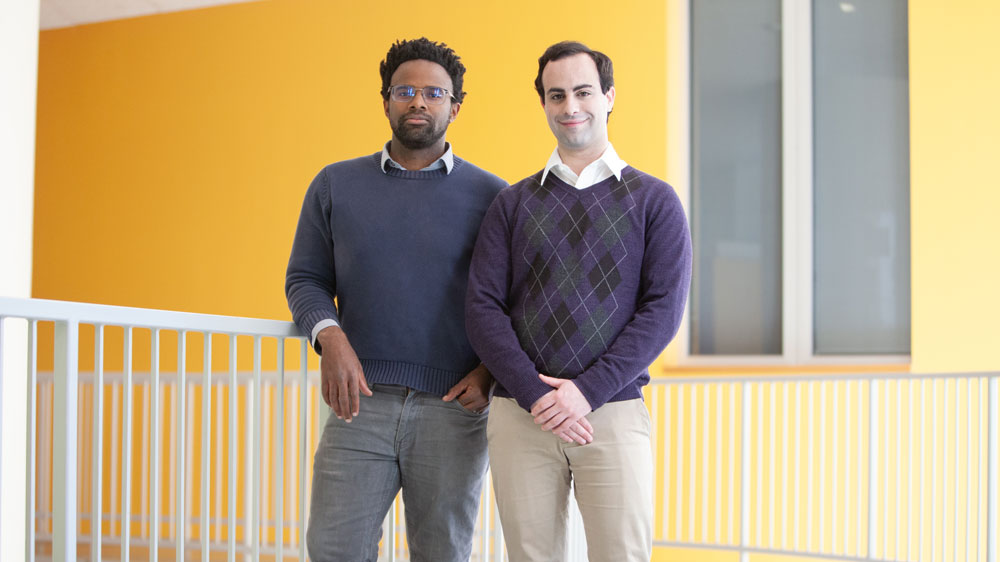 An image of Carbin and Frankle at MIT