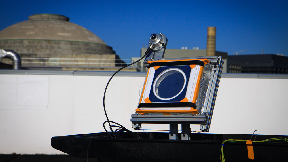 a small heat collection test device installed on a rooftop at MIT