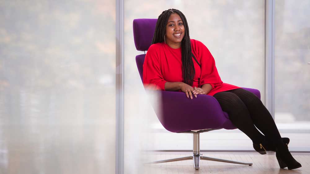 A portrait of Jaleesa Trapp on MIT's campus