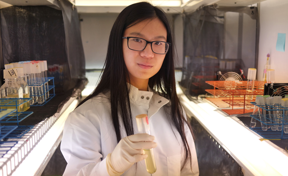 A portrait of Rachel Shen in a lab