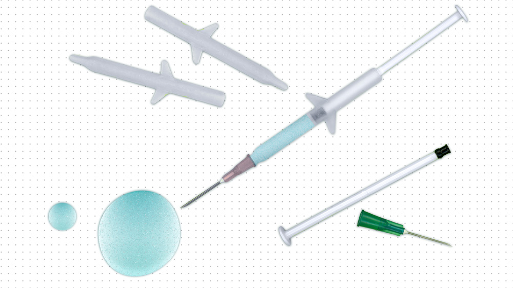 syringes nanoparticle-filled fluid on a surface