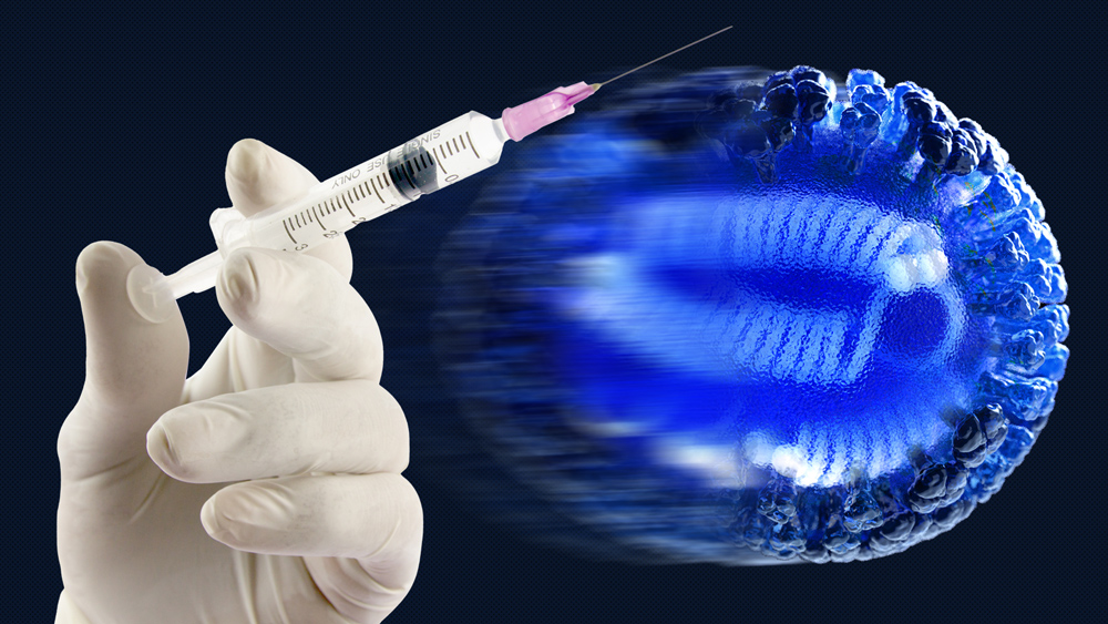 gloved handle holding syringe with blue cell in background