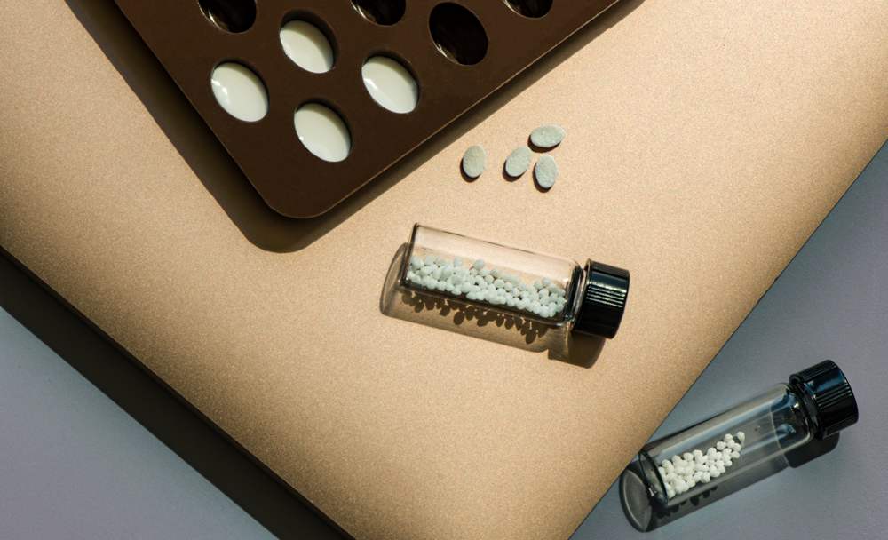 small pills in vials by Felice Frankel