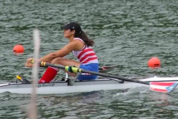 Veronica Toro Arana rowing on a body of water
