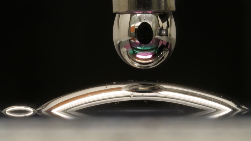 Mercury droplet spreading on a surface