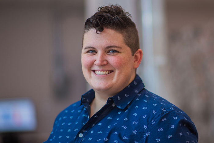 Portrait photo of Joy Dunn with blurry background