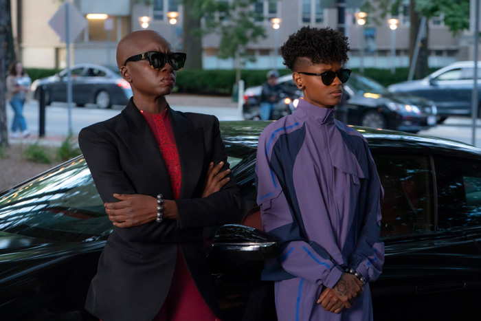 (L-R): Danai Gurira as Okoye and Letitia Wright as Shuri in a video still, as they lean on a nice car outside