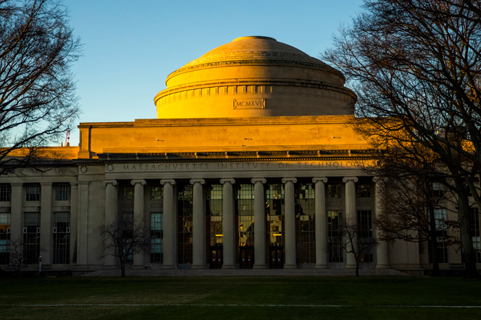 Sunset's warm light hits MIT Great Dome and Killian court