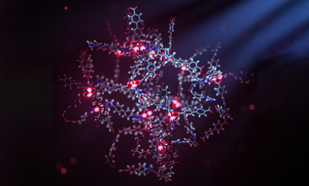 A 3D rendering of a MOF made of metal and organic molecules, in the general shape of a loose, hollow, ball. The MOF is made of glowing pink orbs and grey hexagon-shaped bits that connect to red and blue bits.