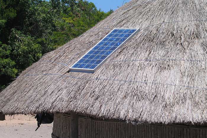 Solar panel on thatched grass roof