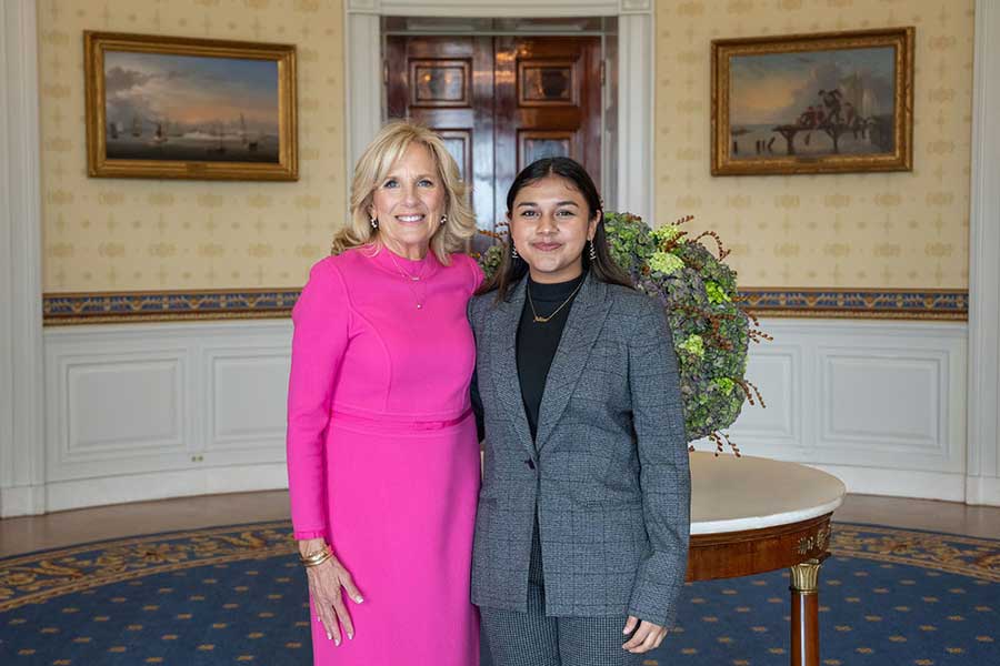 First Lady Jill Biden, left, poses with Gitanjali Rao at the White House