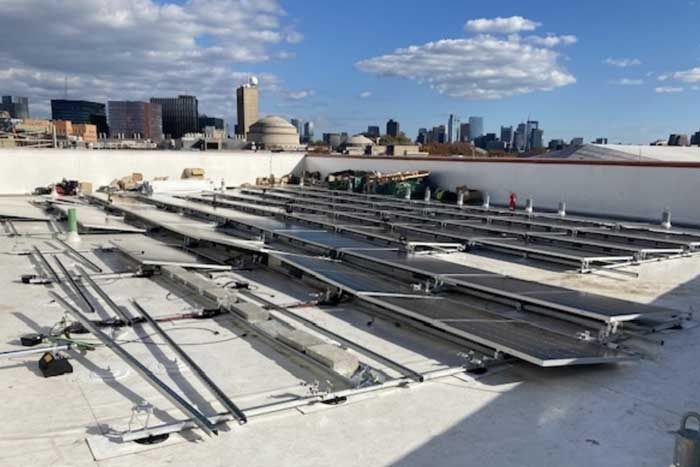 solar panels being installed on a roof 