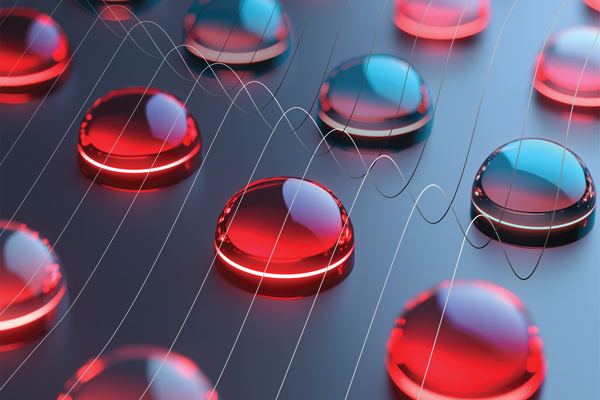 grid of red droplets on metal surface